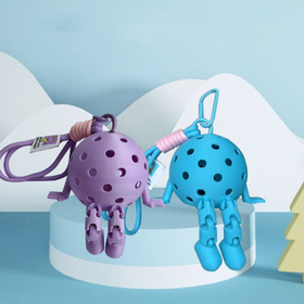 Purple and blue ball-shaped keychains with a carabiner on a light blue background
